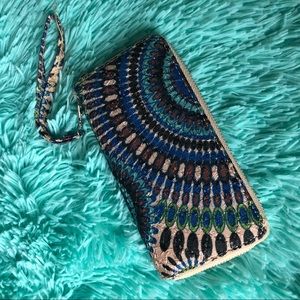 Boho design on a wrist wallet purse with zipper